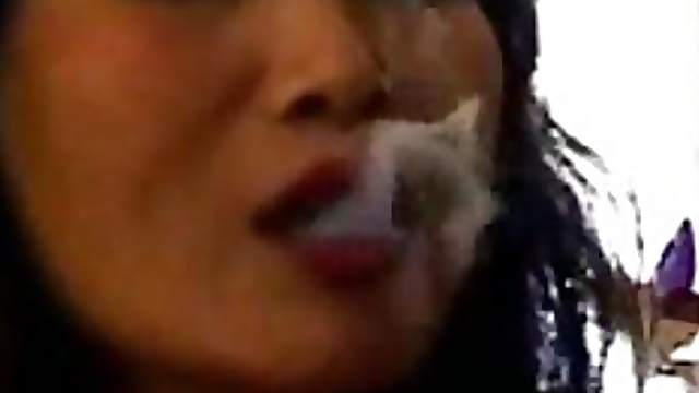 Asian babe smoking and talking