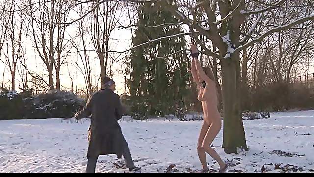 Snow, fear and whipping in an outdoor bondage submission