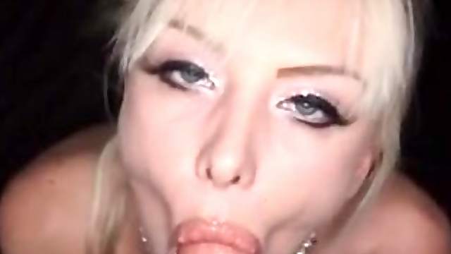 Slutty blonde in heavy eye makeup sucks cock