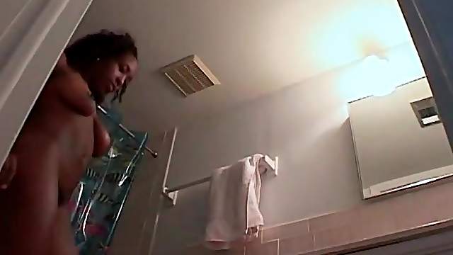 Hidden cam films black girl after a shower