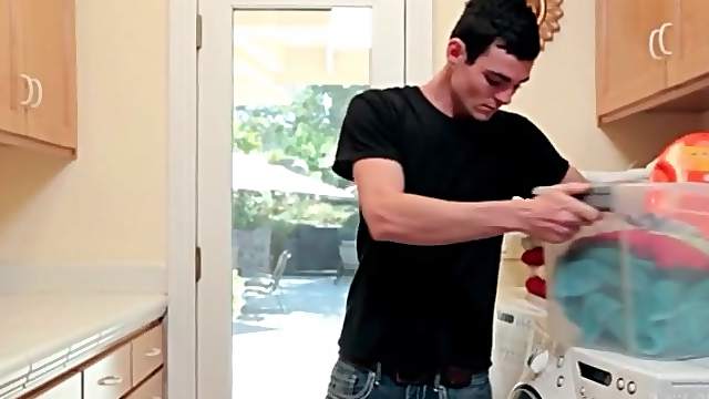 Cute guy jerks off on laundry day