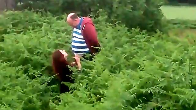 Busty wife jerks off a stranger in a field
