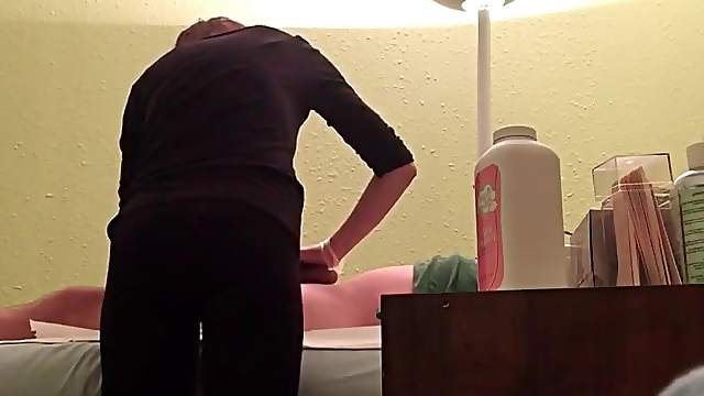Waxing girl cleans his pubes and gives a handjob