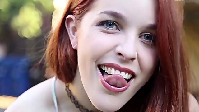 Smoking is an erotic treat when this redhead does it