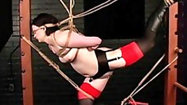 Bondage slut enjoys the ropes and pain