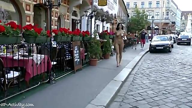 Hot girl walks by restaurants naked