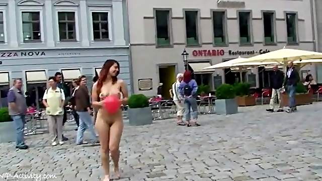 Redhead naked in the public square
