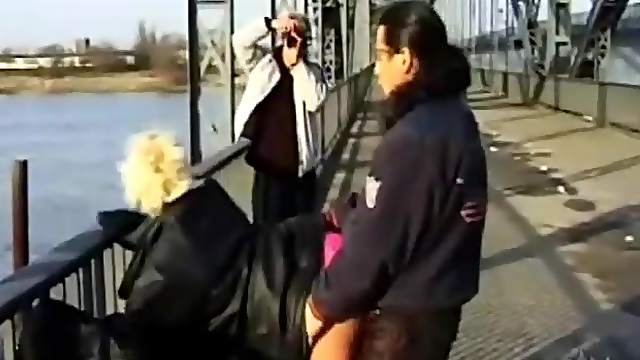 Girl walks on the bridge to have public sex